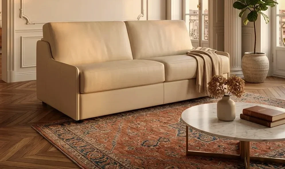 Cream leather convertible sofa in a Haussmann-style living room